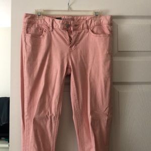 Blush pink skinny jeans